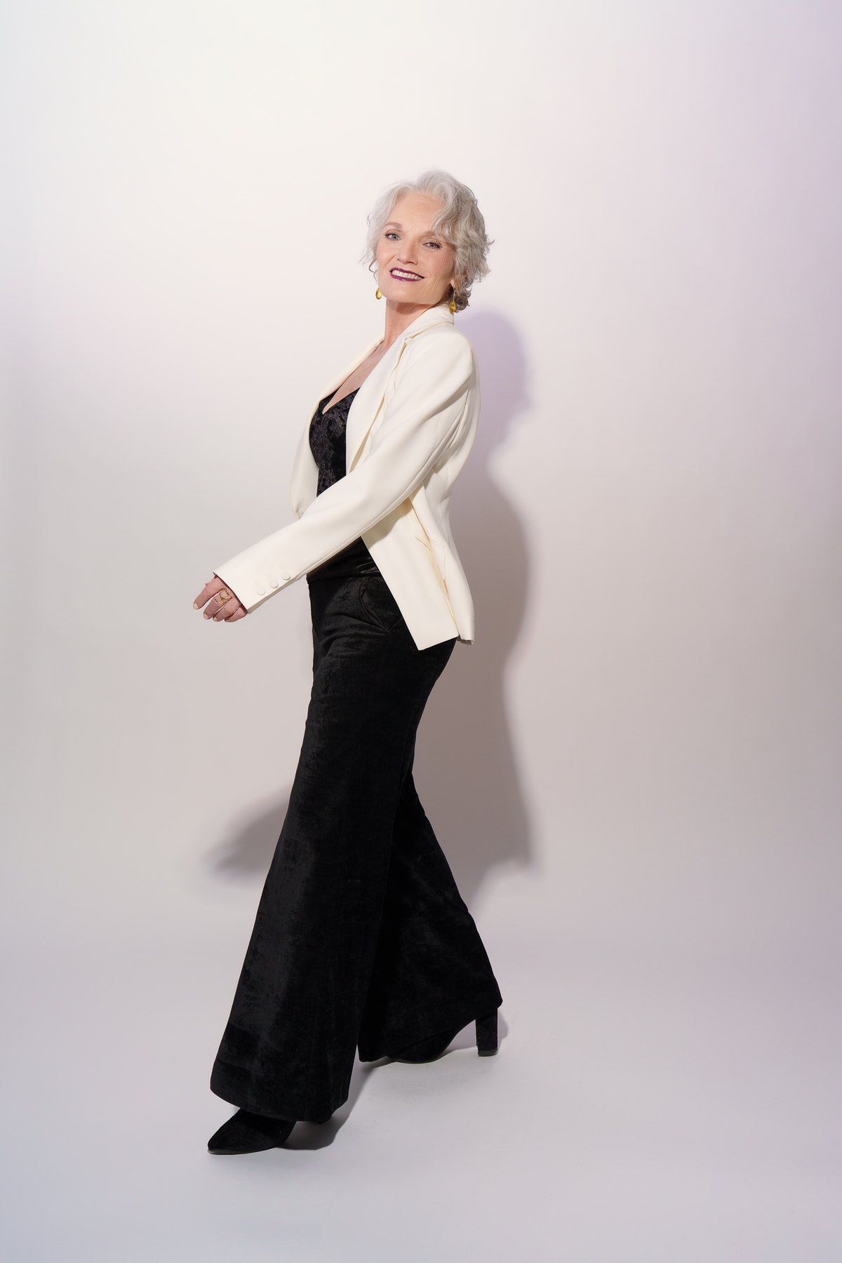 Catherine Handy TV and film casting, full body ivory blazer and black velvet, Kat Hennessey