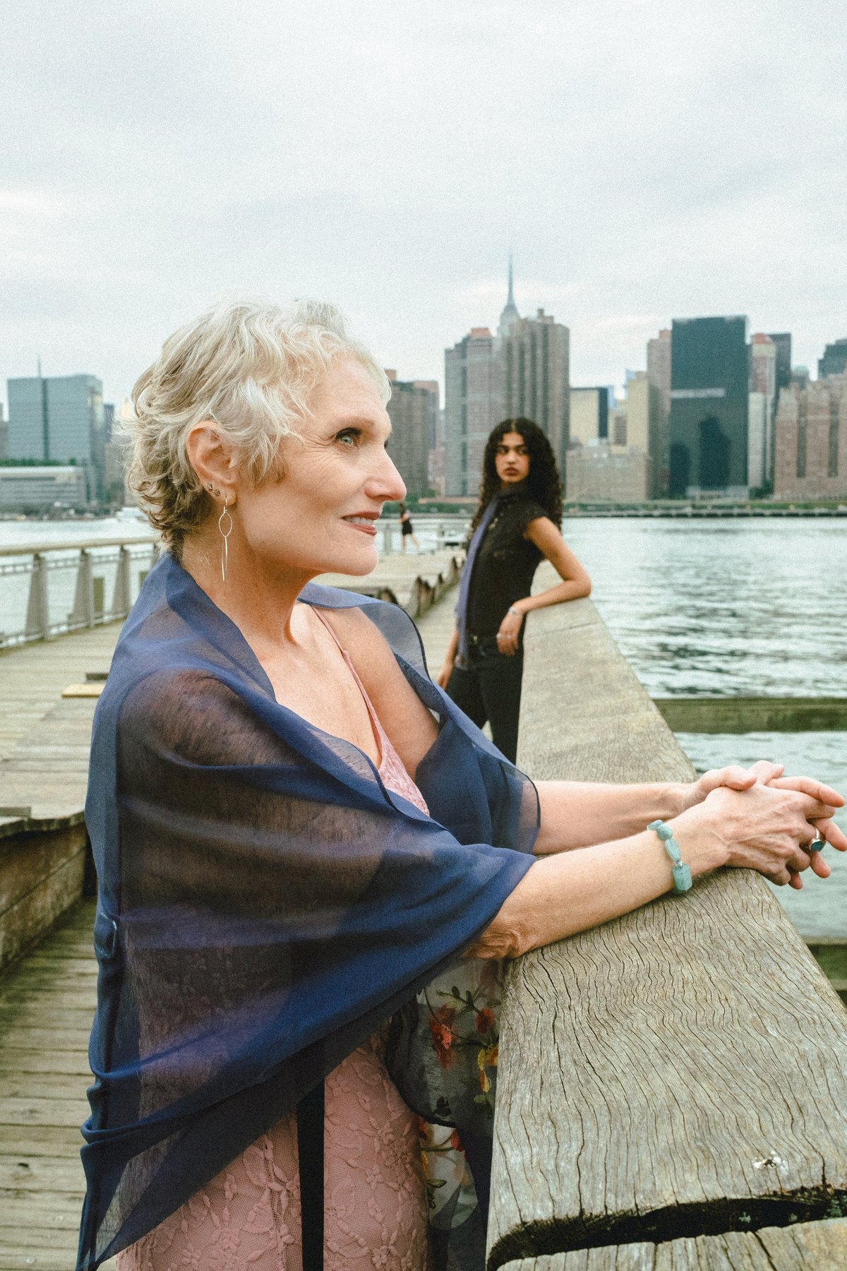 Catherine Handy in The Reason, waterfront, Manhattan skyline